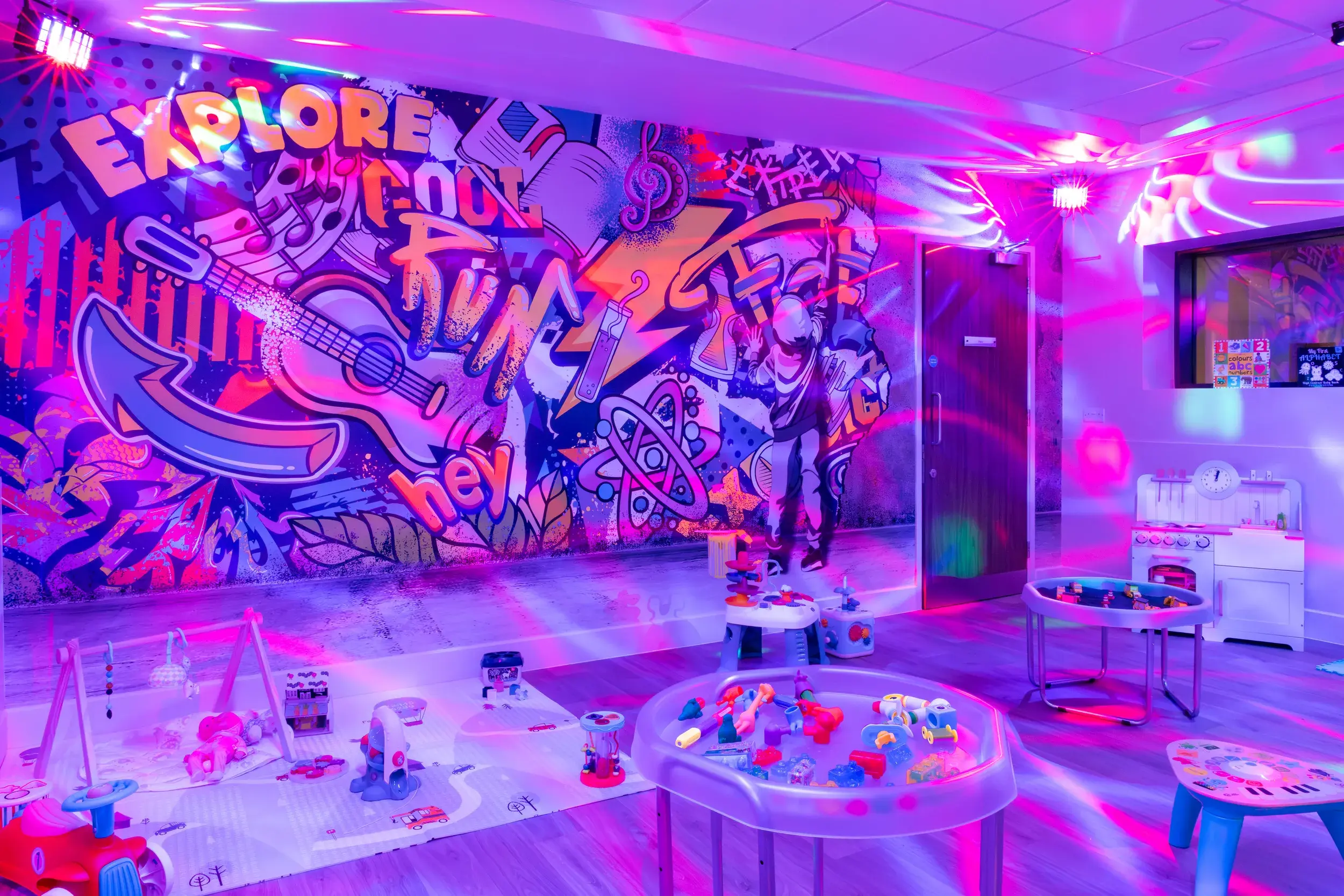 A kids club room with disco lights