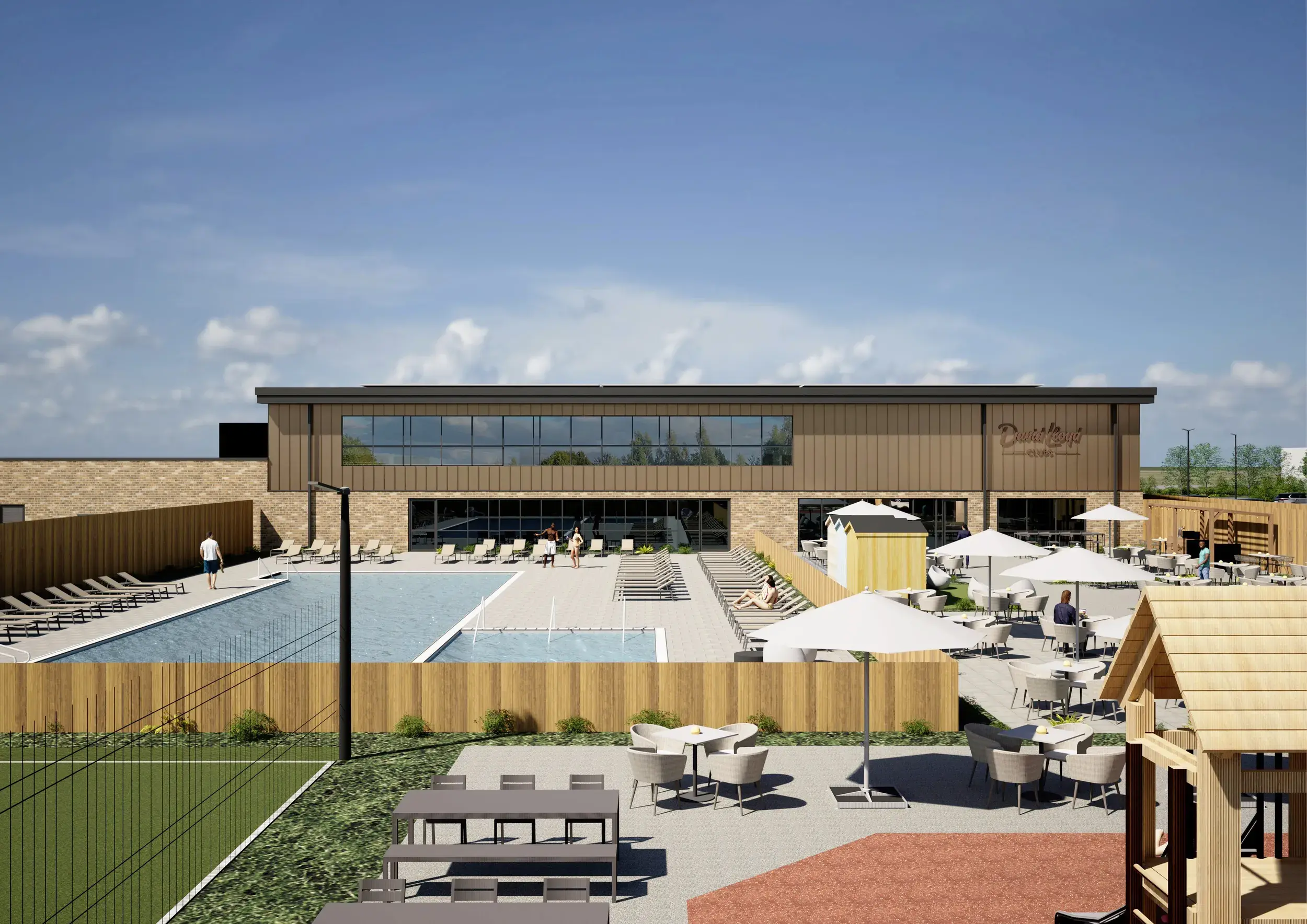 A woman pushing a sled in the gym