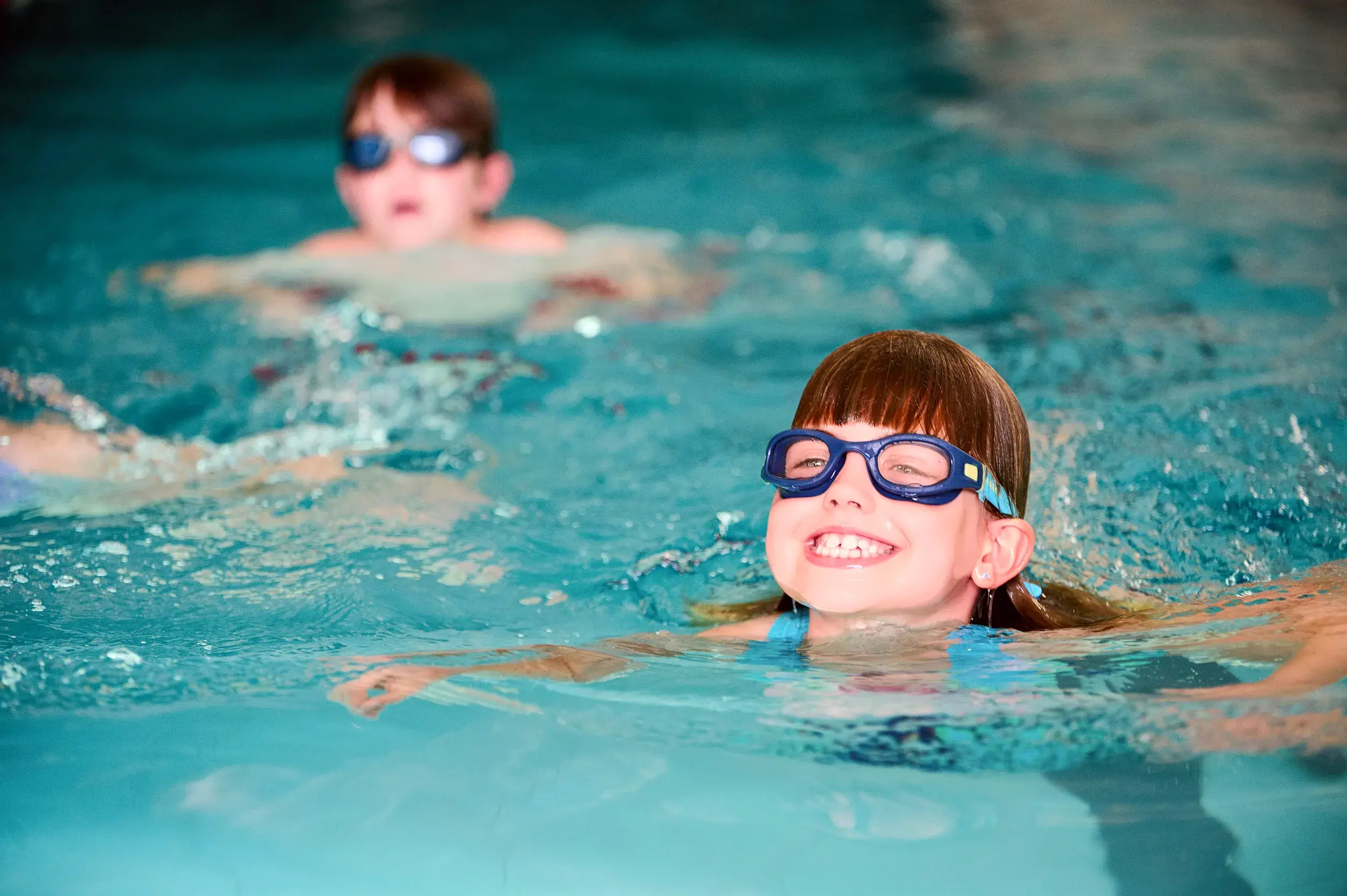 Children swimming in the pool
