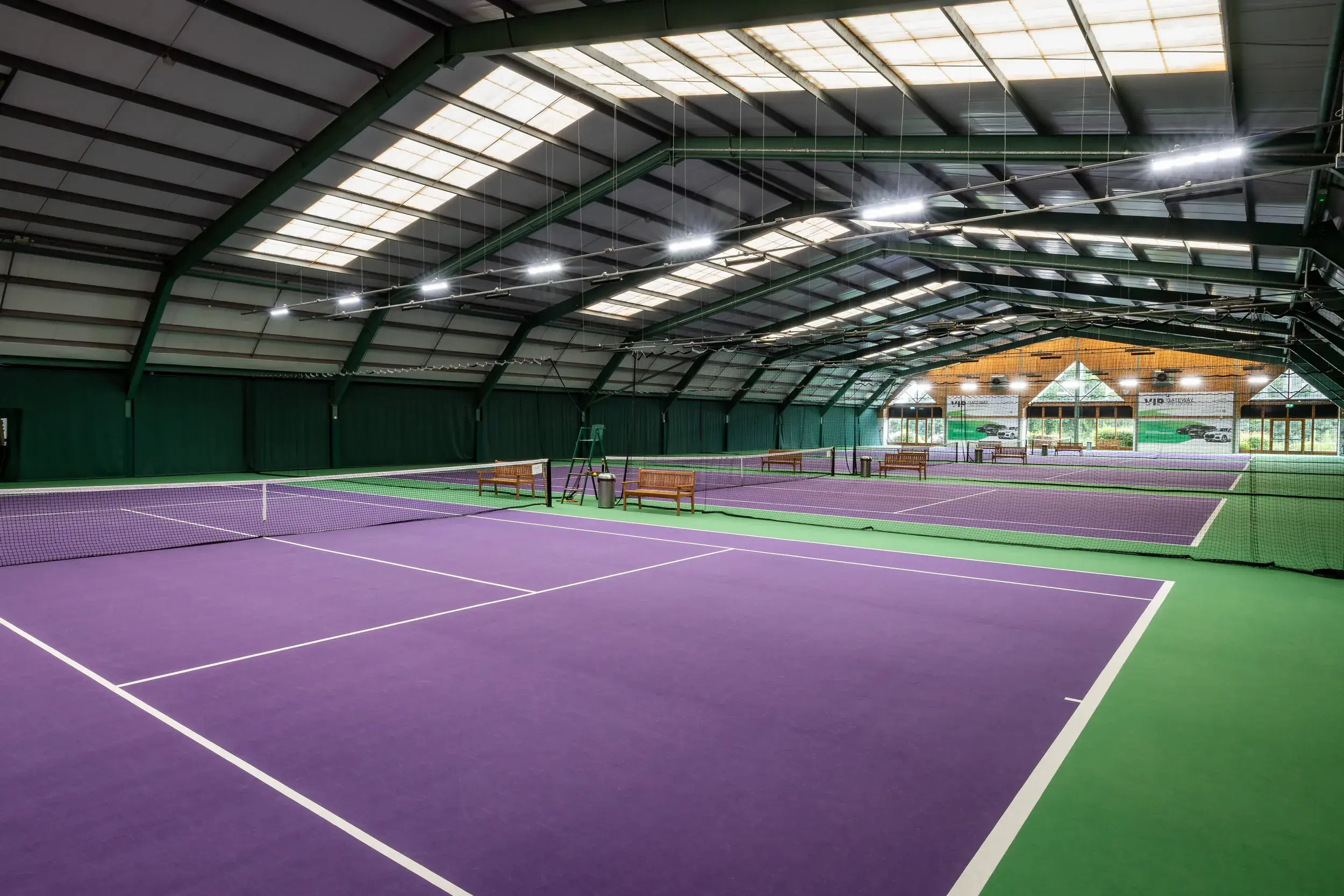 Indoor tennis courts at David Lloyd Manchester Trafford City