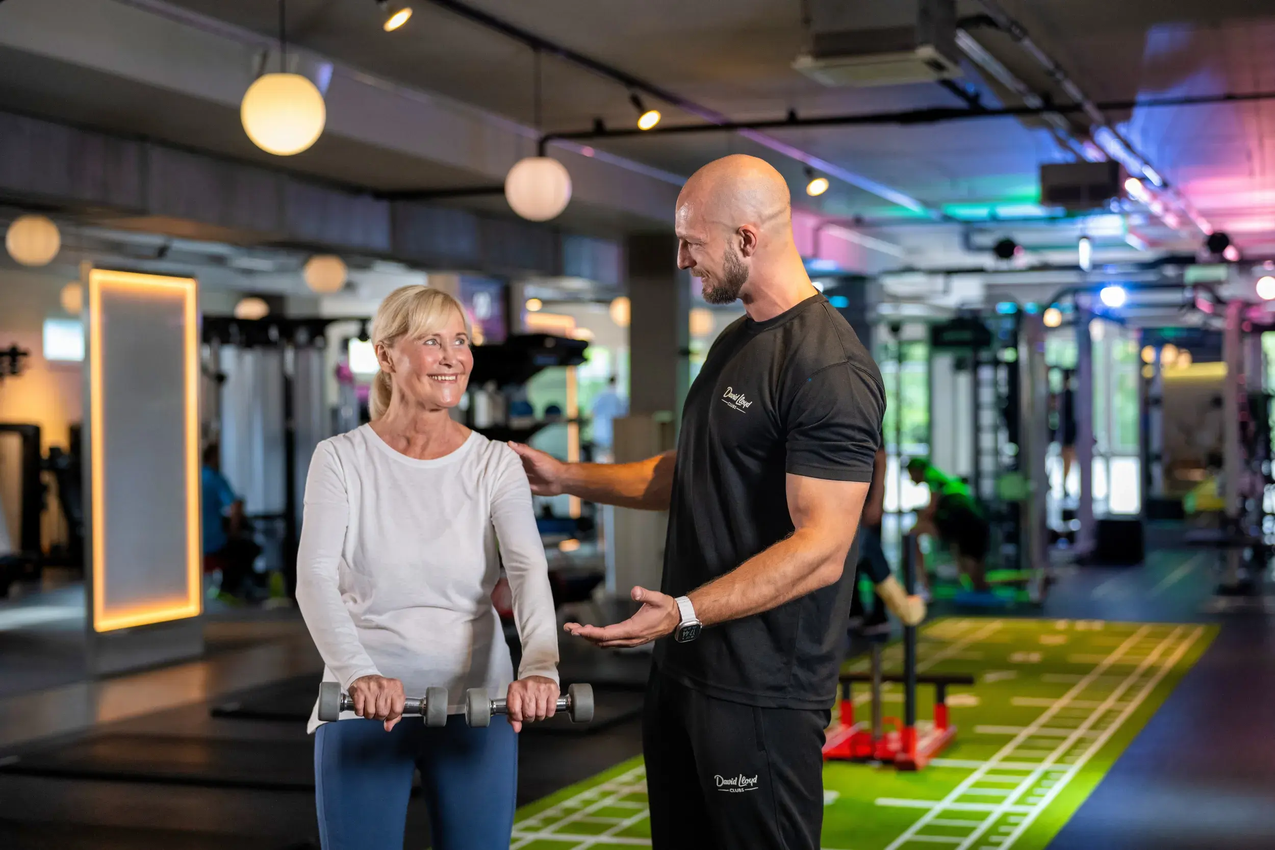 PT and client in the gym
