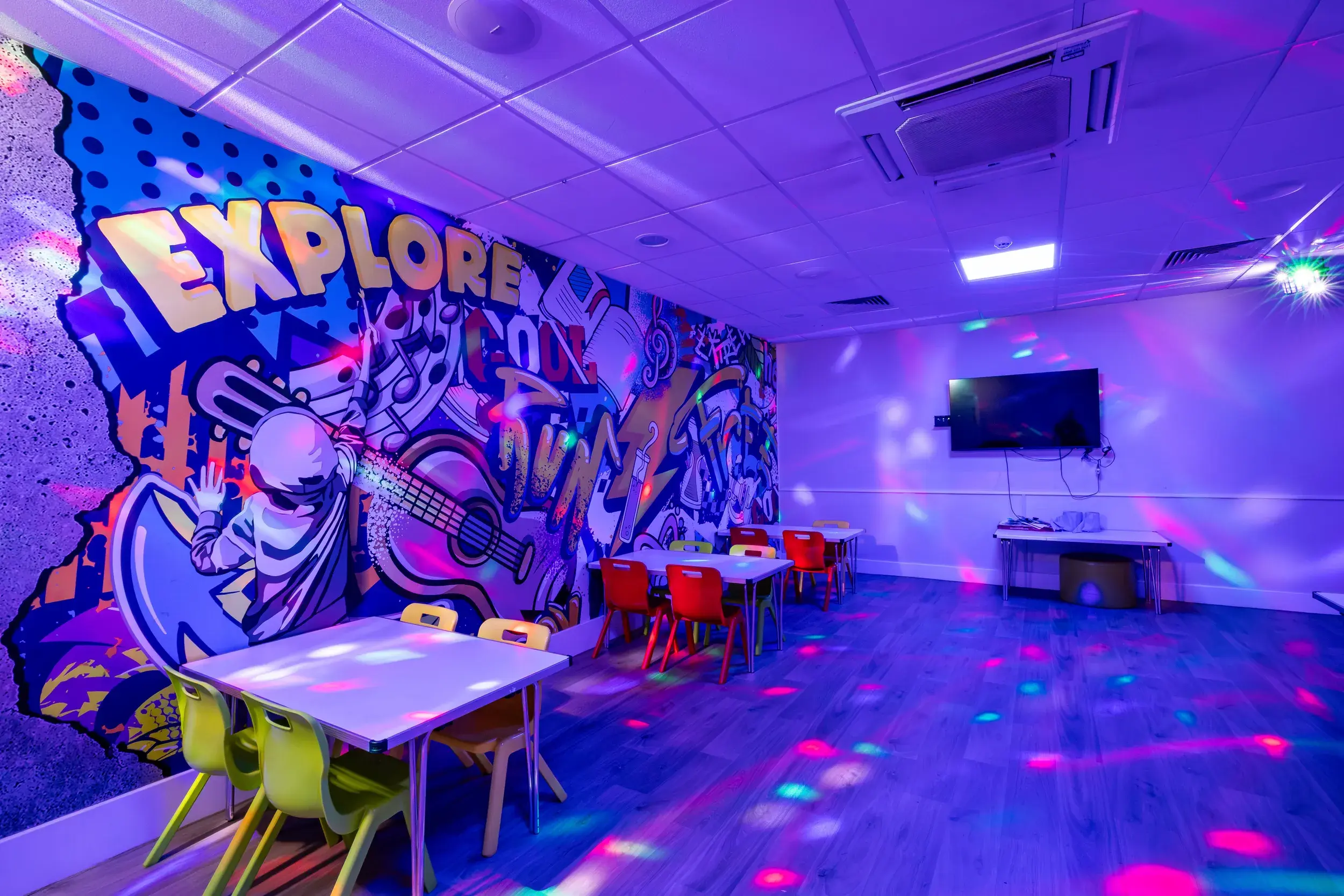 Graffiti wall with colourful lights 