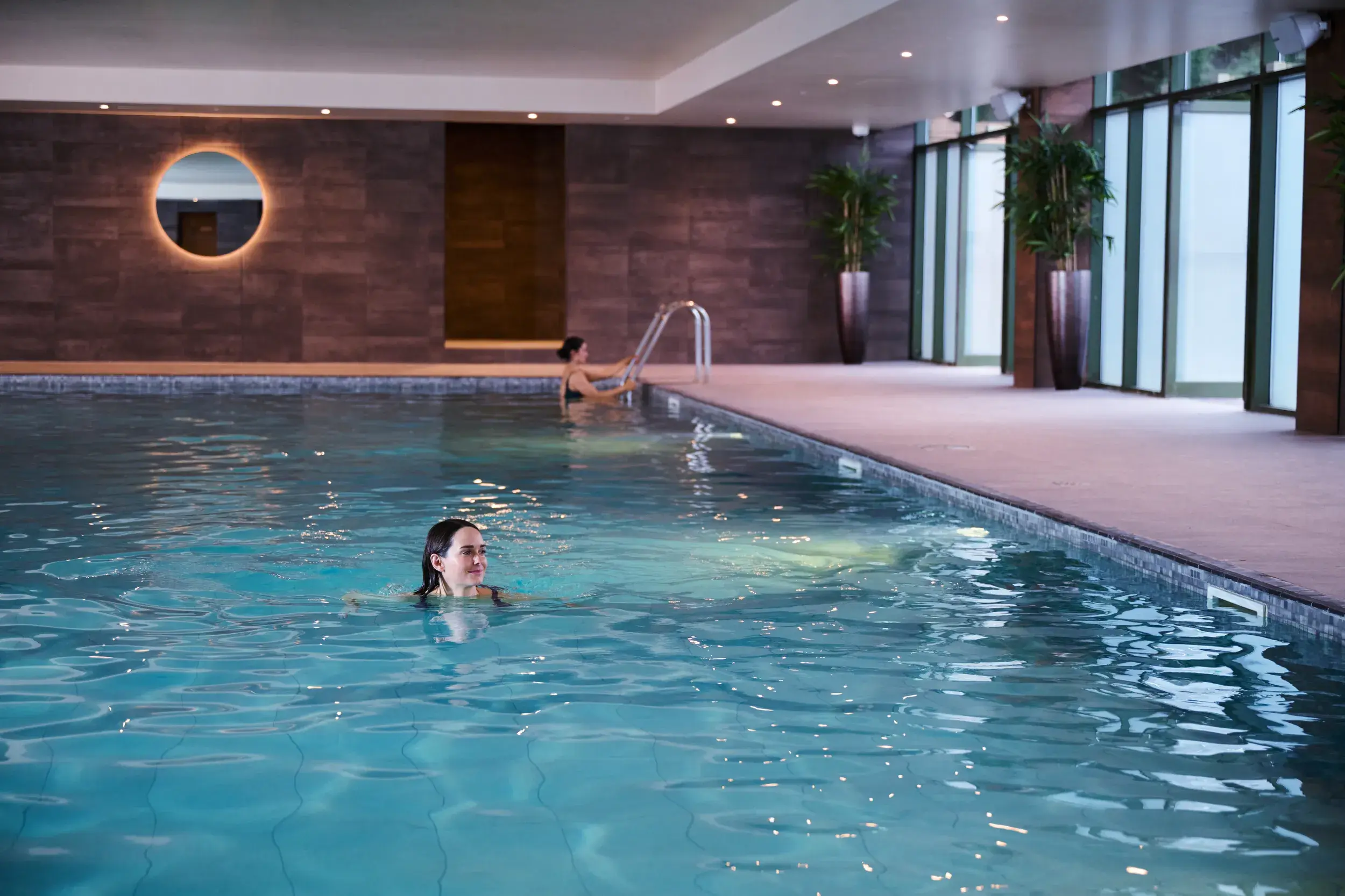 A woman swimming in the pool
