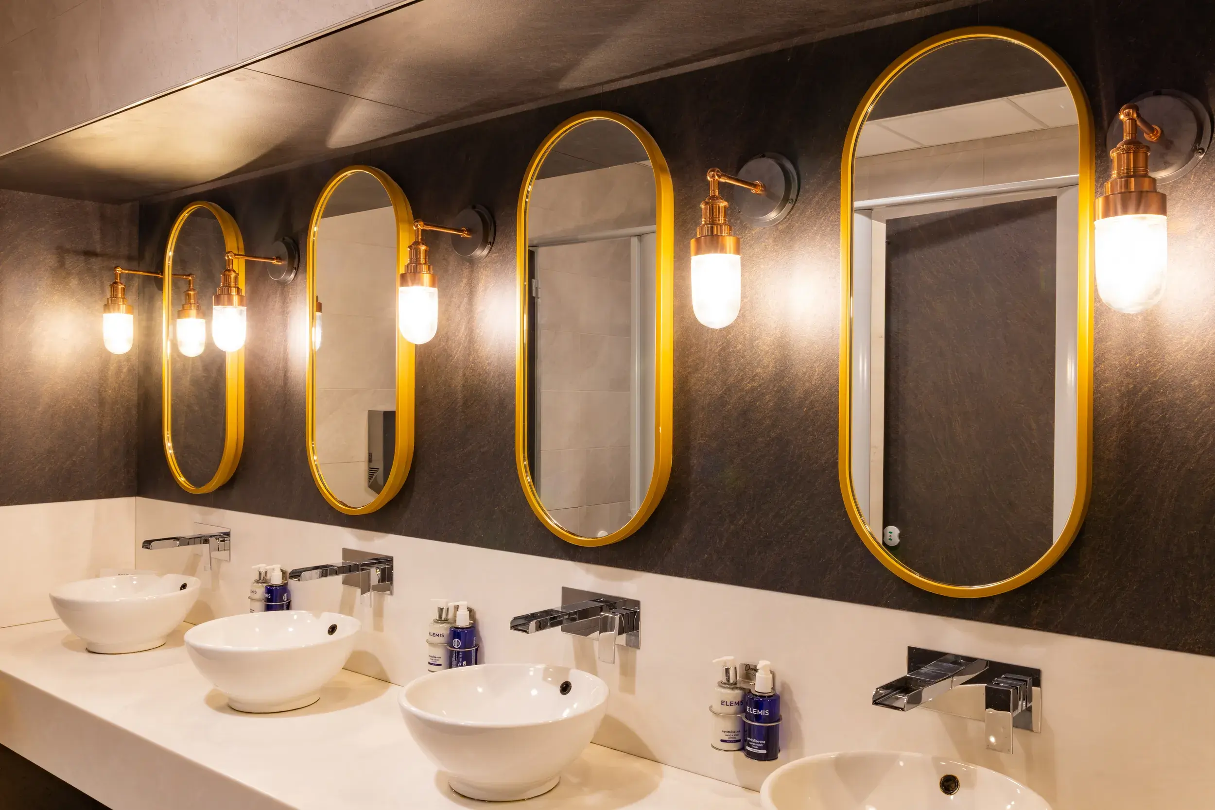 Sinks and mirrors in the changing rooms at David Lloyd Gloucester 