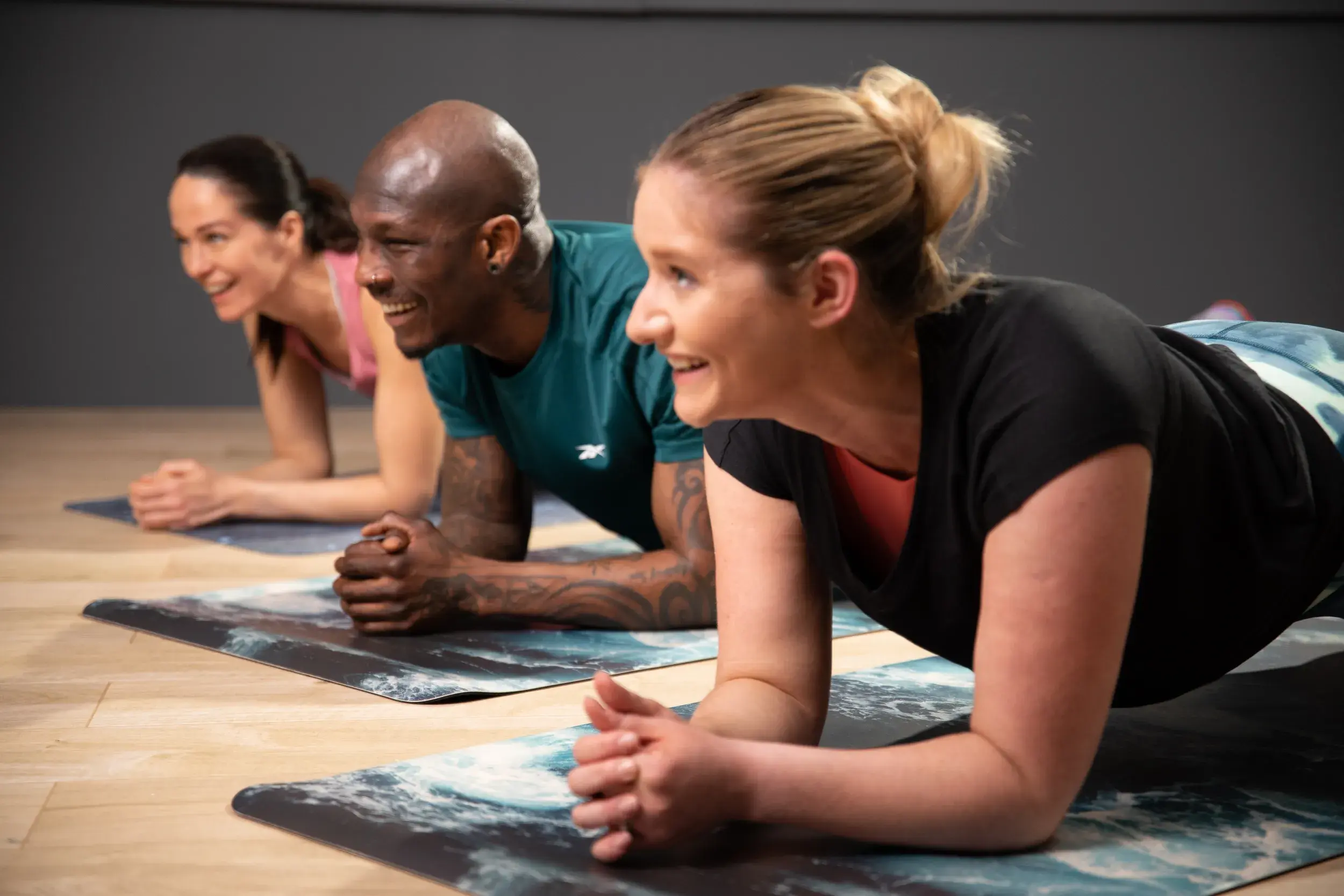 A group of people doing Pilates