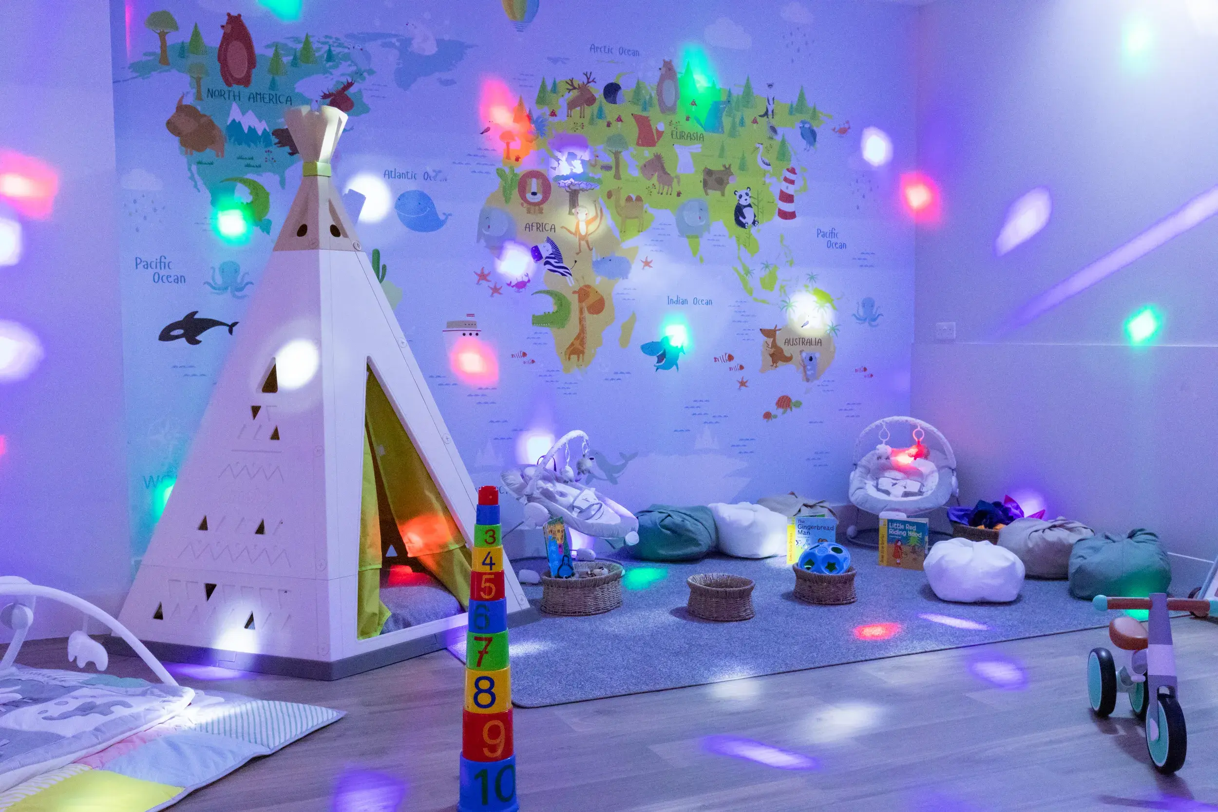 Lights and toys in a kids' playroom at Cricklewood Lane