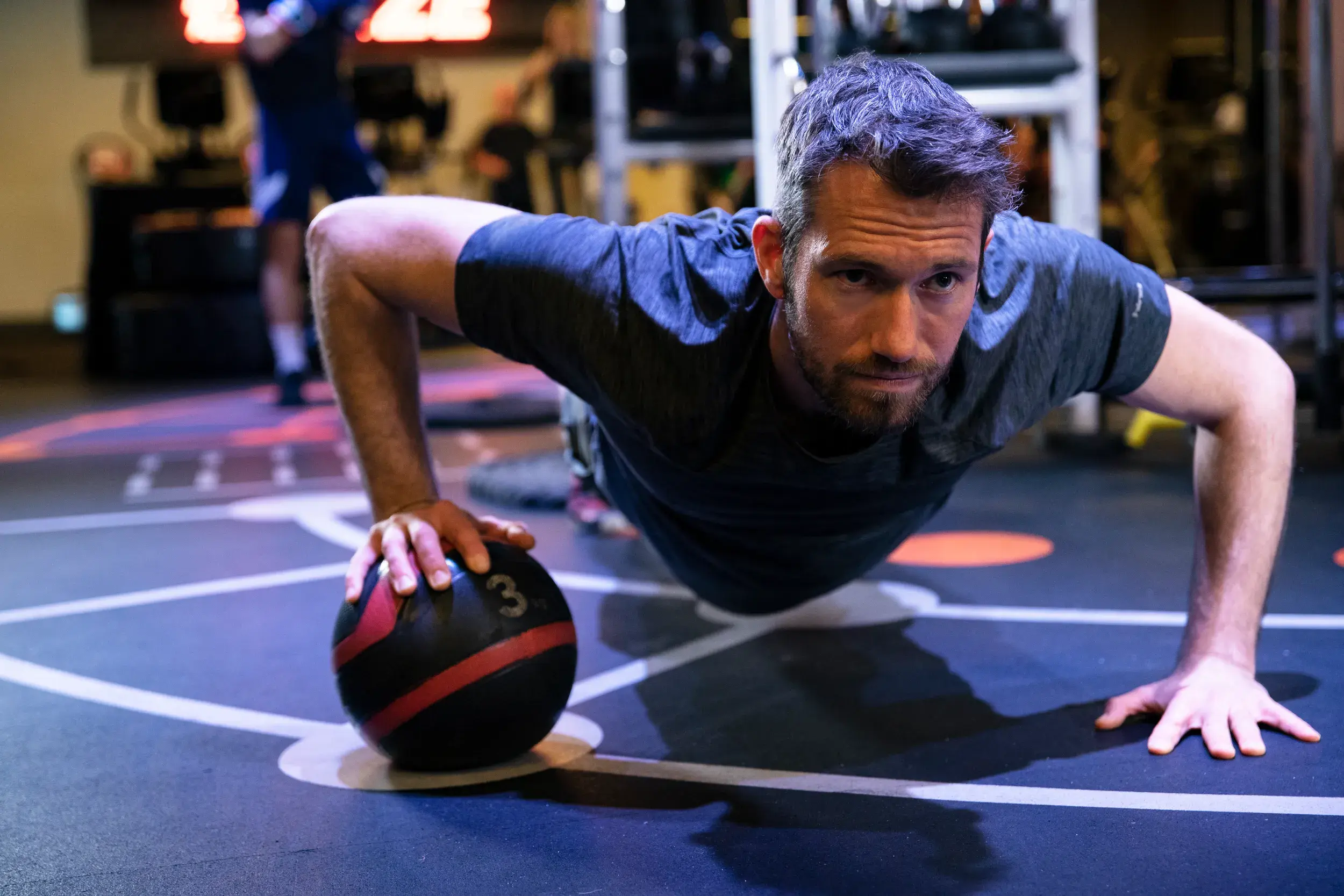 A man working out with a ball