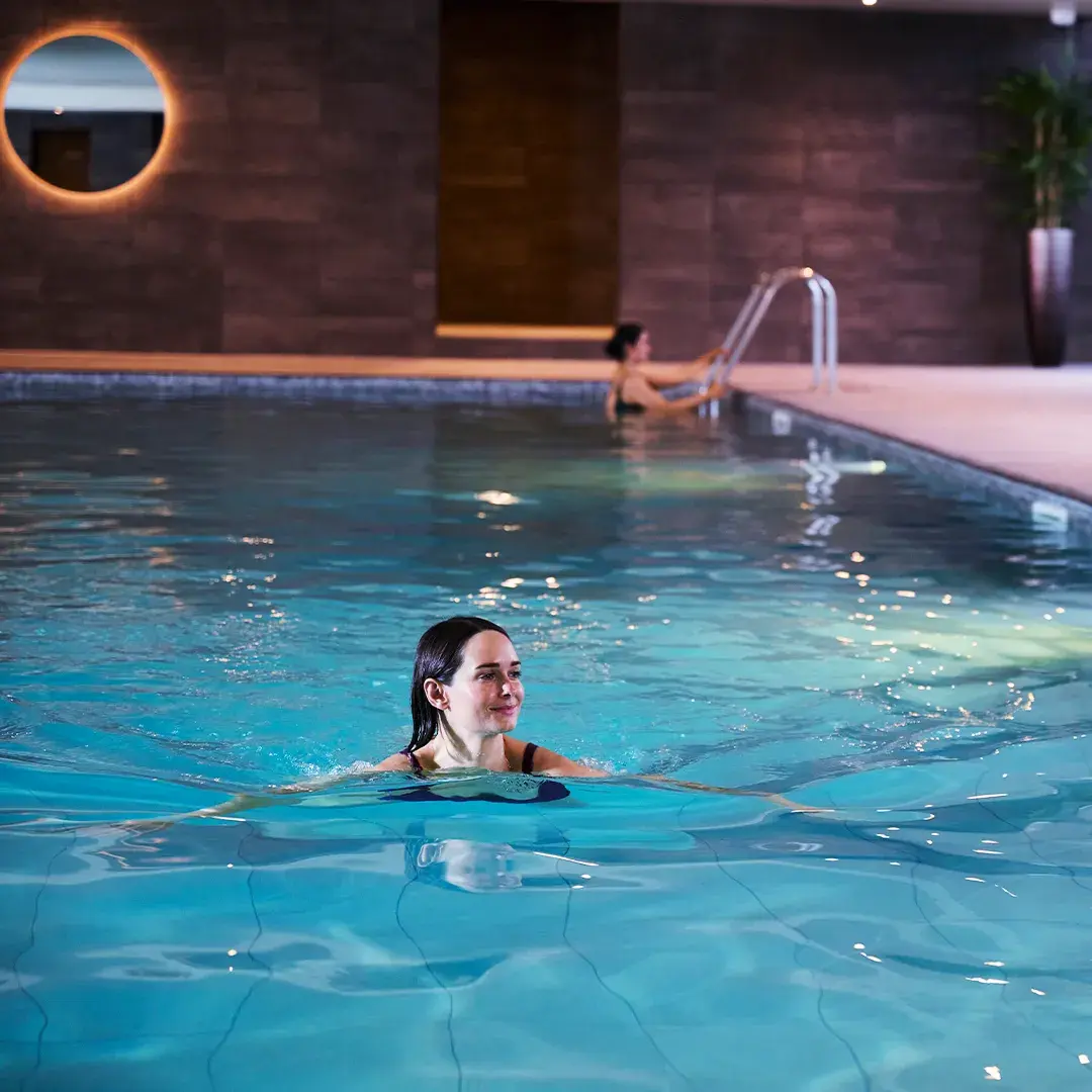 A man swimming front crawl