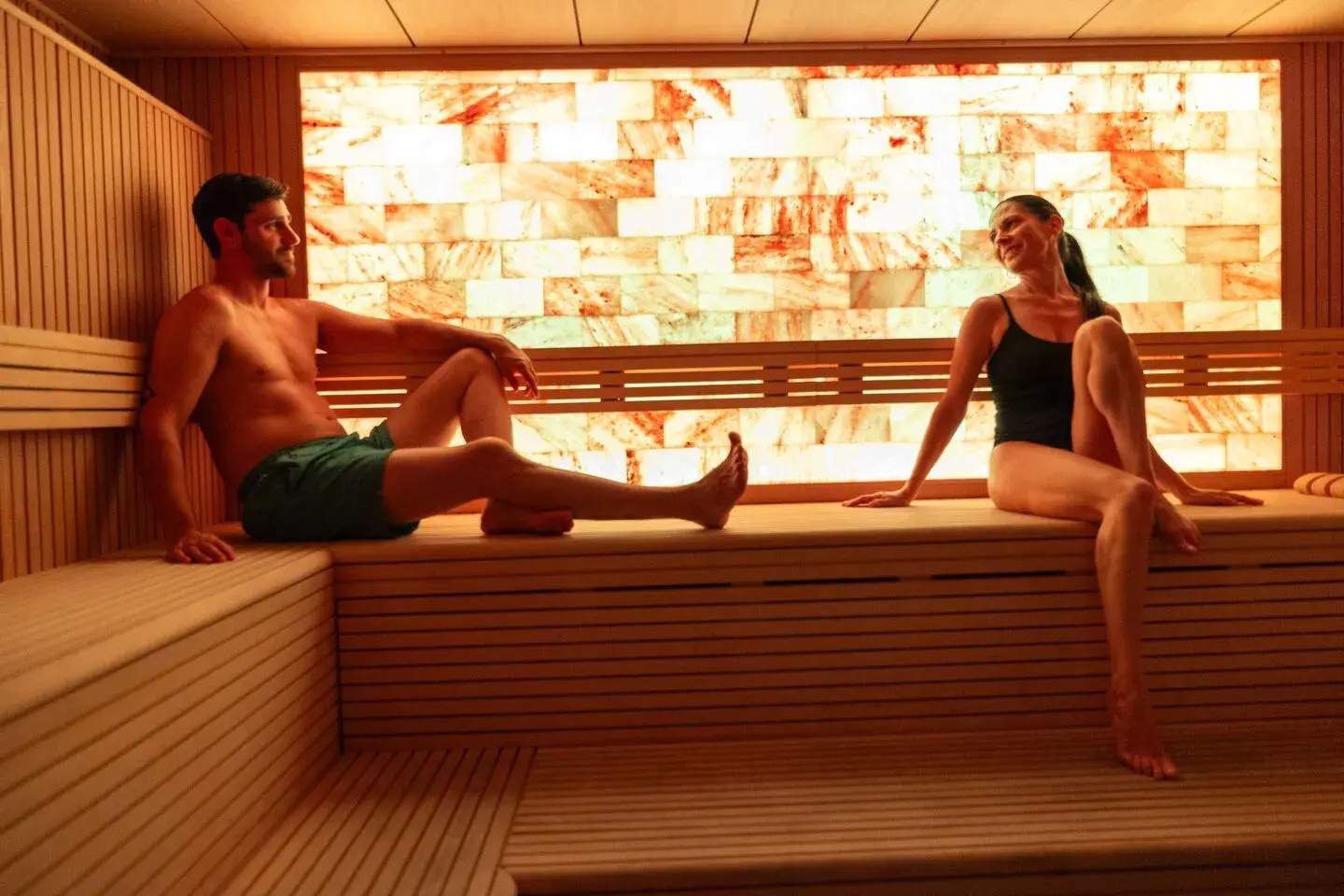 Two people enjoying the sauna
