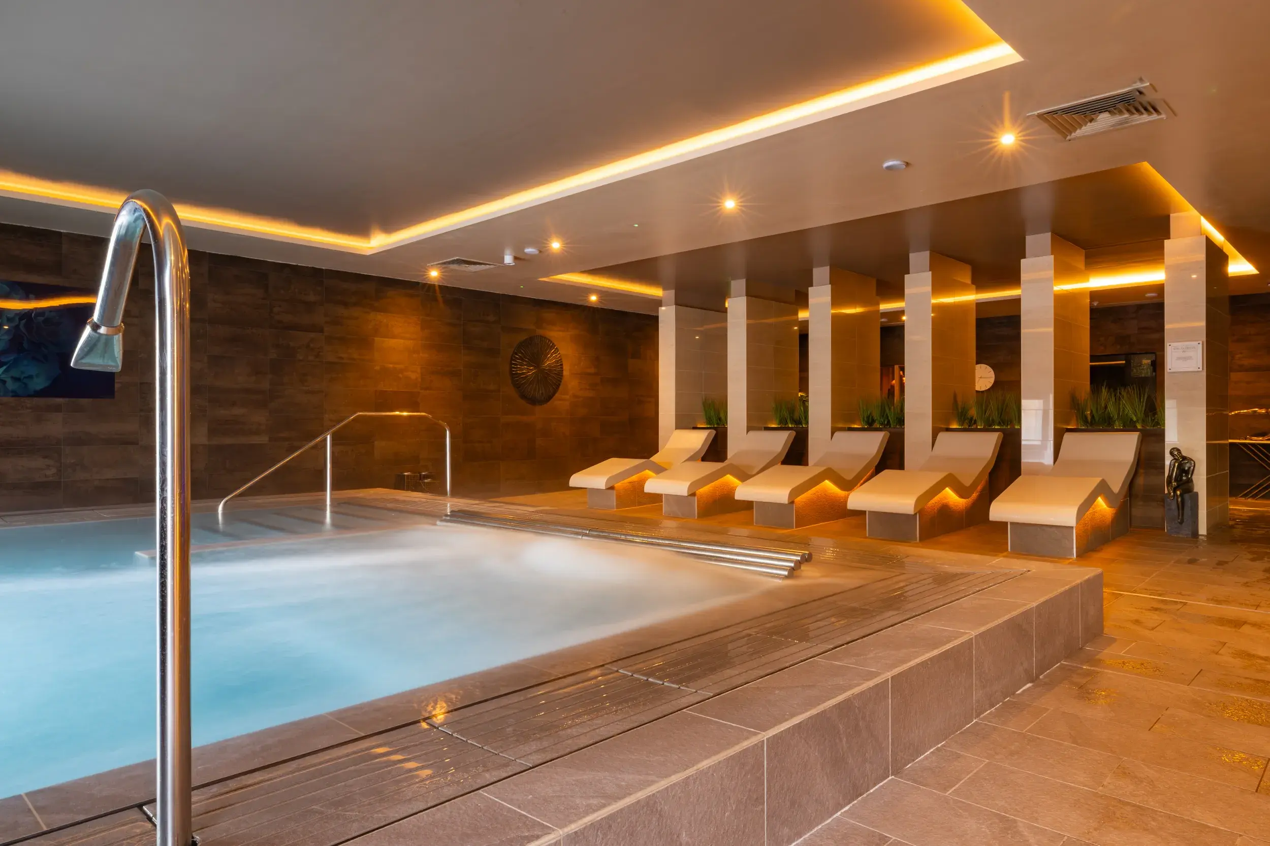 Two women relaxing in the outdoor hydropool