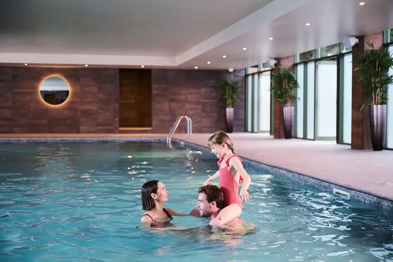 A family in the pool