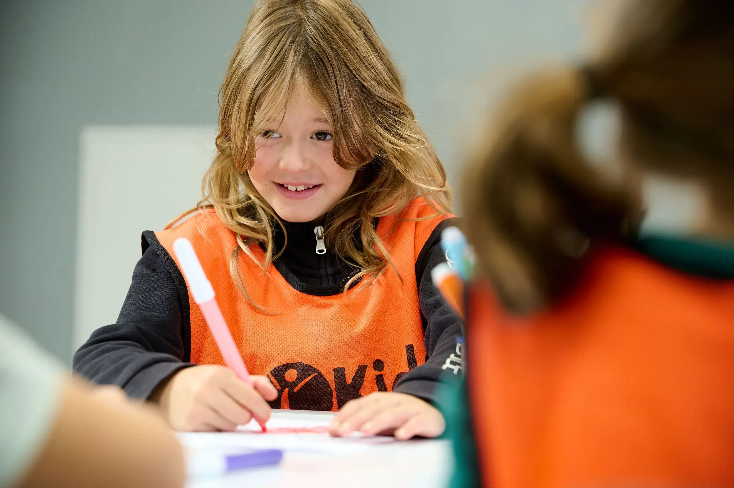A mum and two children in the changing room