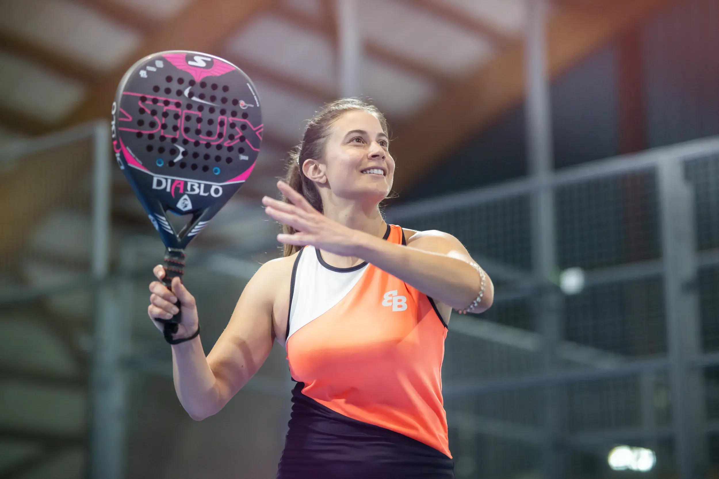 A woman playing Padel
