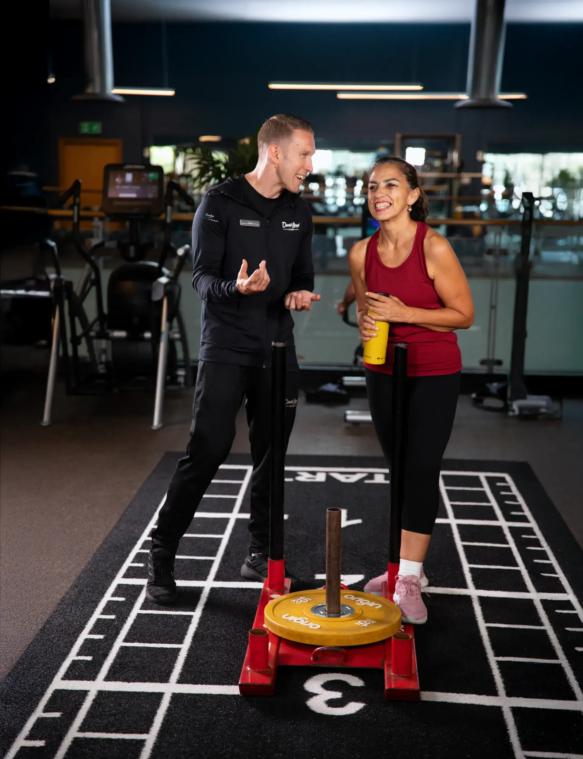 A woman doing a PT session