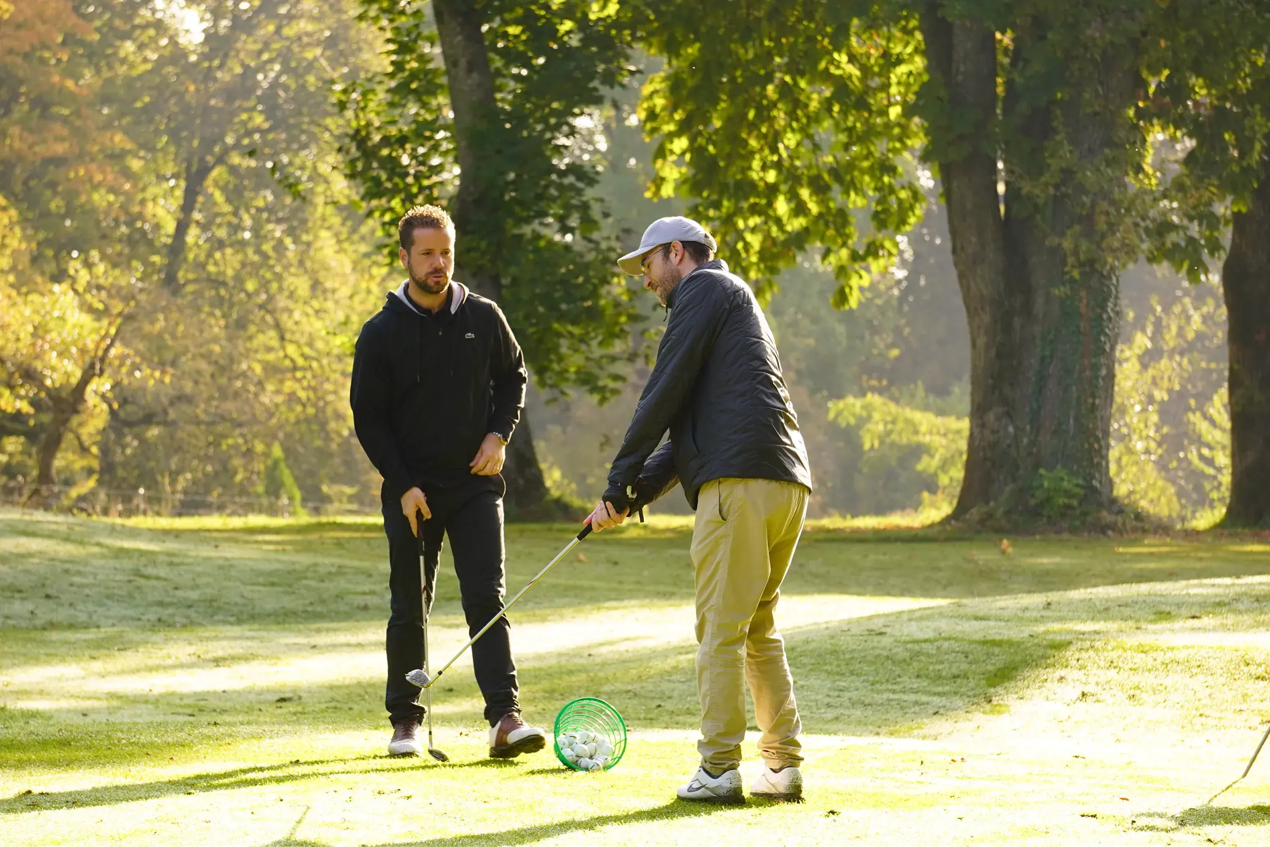 Two men plating golf