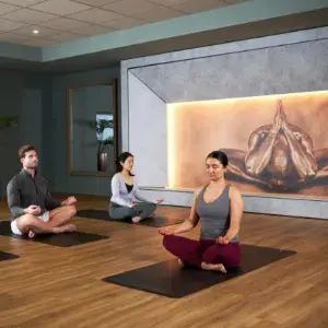 A group of people in a yoga class in David Lloyd Serrano